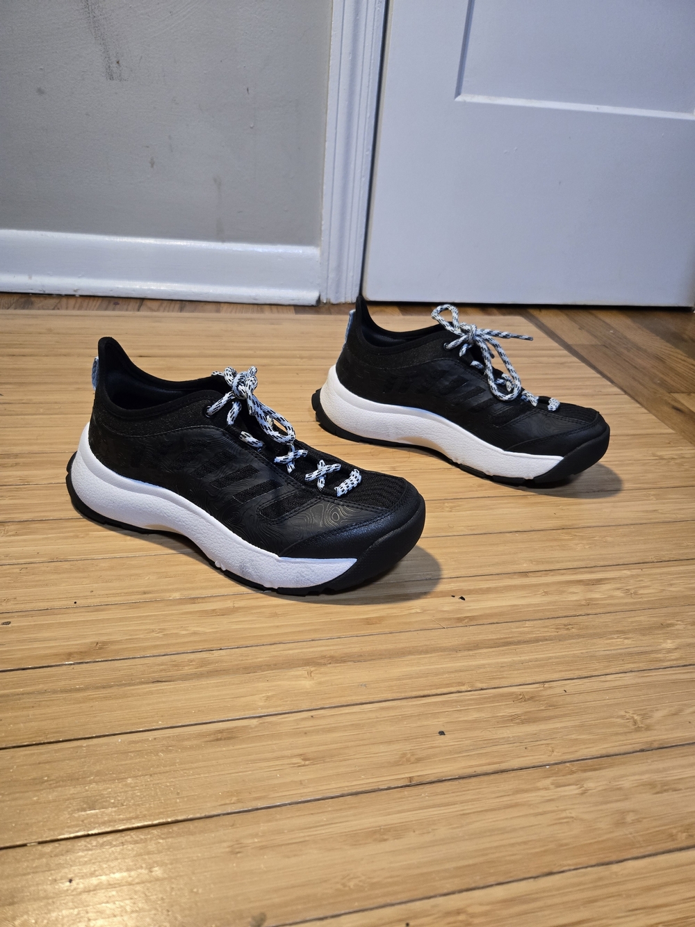 Eddie Bauer Women's Black Athletic Sneakers with White Midsole
